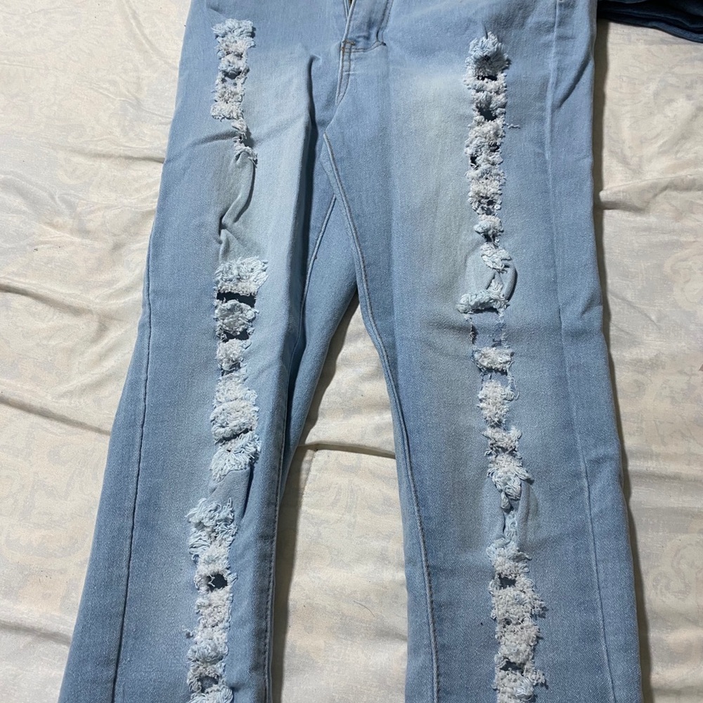 Distressed ripped jeans